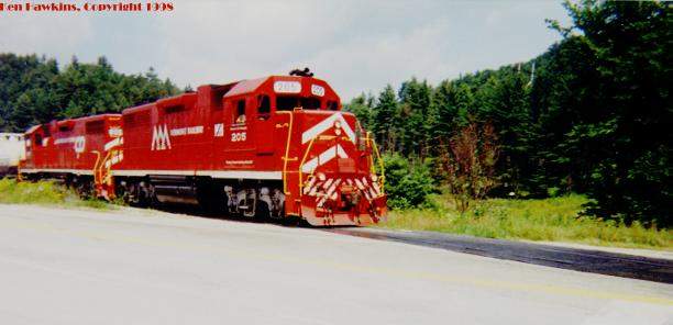 Photo of Vermont Railway 205 crossing Rt. 103 in North Shrewsbury, VT