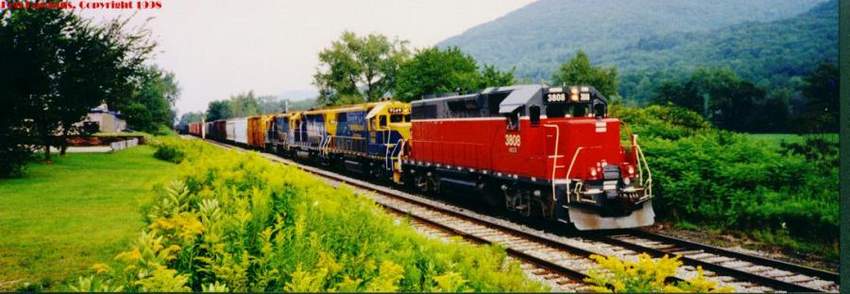 Photo of NECR 3808 leading Train 323 on a backup move in Bolton, VT