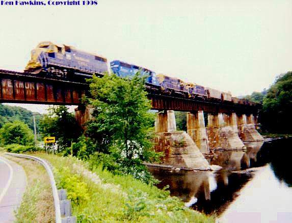 Photo of NECR 9528 leading Train 323 across the West Hartford bridge.