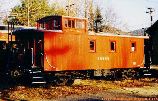 Photo of Grand Trunk's 75955 wooden caboose at North Conway, NH.