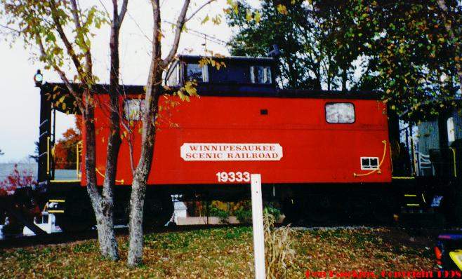 Photo of Winnipesaukee Scenic Railroad's caboose # 19333 in Meredith, NH.