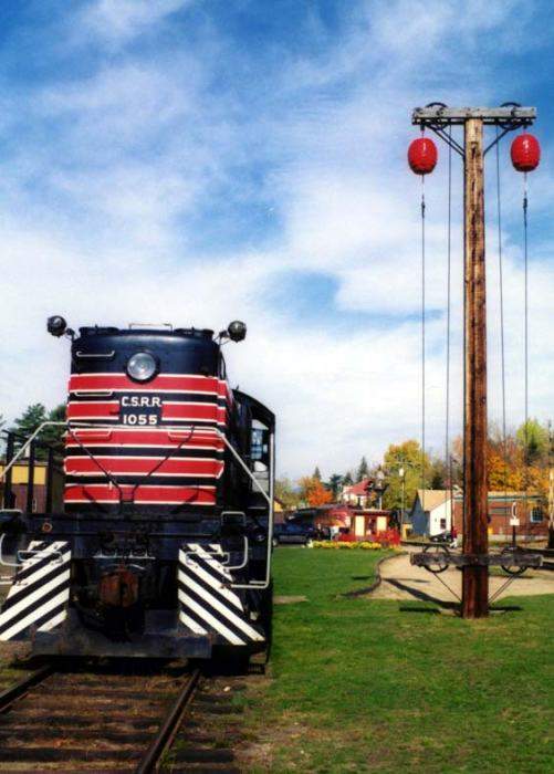 Photo of Conway Scenic 1055 poses with ball signal at North Conway, NH.