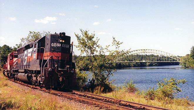 Photo of Coal train poses with highway bridge at Tyngsboro, MA.