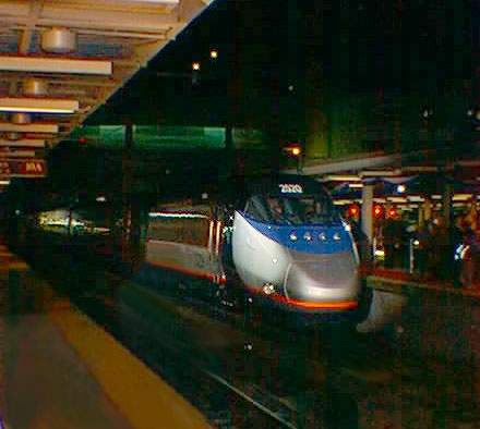 Photo of Acela Express' inaugural run #958 arrives on track 9 of Boston's South Station