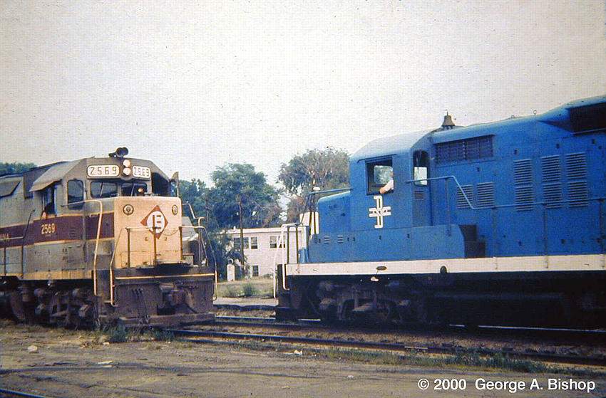 Photo of Erie Lackawanna GP35 #2569 meets B&M GP18 at Ayer, MA in July, 1970