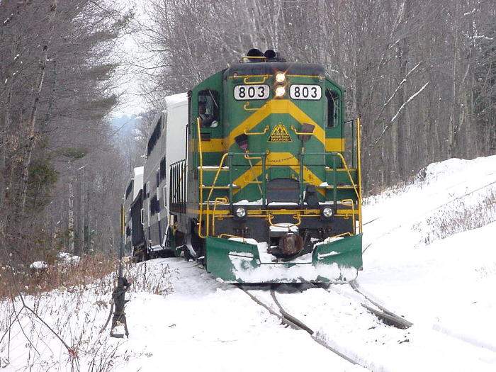 Photo of GMRC 803 crests the switchback heading up the mountain to the Bombardier ...