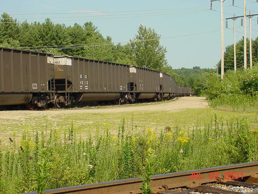 Photo of Empty coal cars lined up on the spur for the PSNH plant in Bow NH