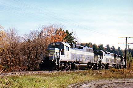 Photo of CDAC GP35s eastbound at Lennoxville QC Oct. '97 (c) Mick Hall