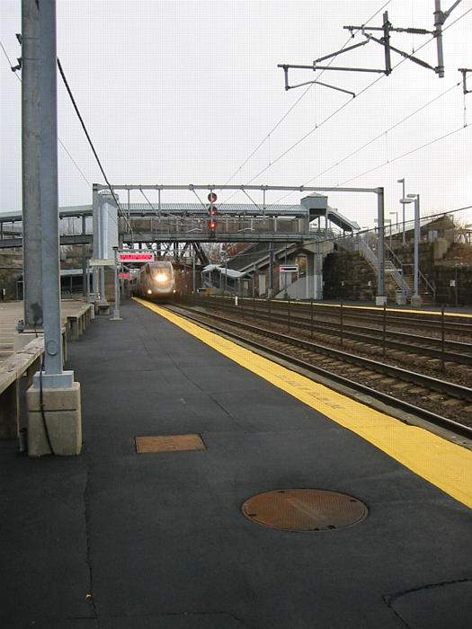 Photo of An Acela passes through Readville at a good clip :-)