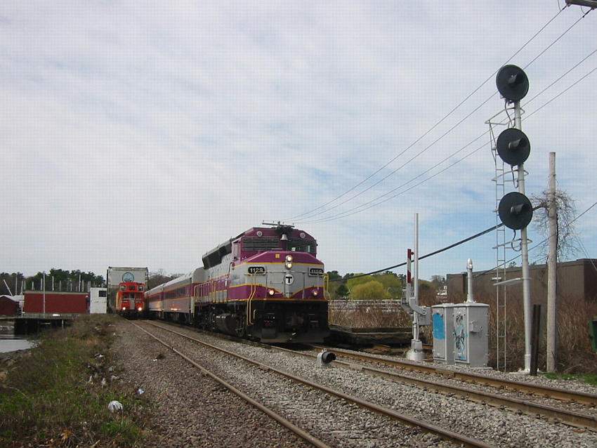Photo of Rockport bound train passes MBTA work extra at Manchester Draw