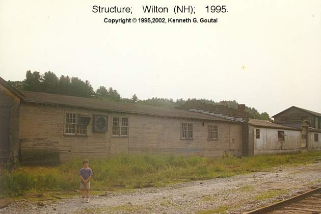Photo of Two more buildings trackside in Wilton (NH), Summer, 1995.