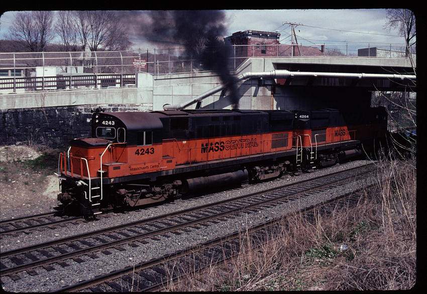 Photo of Mass Central #4243 and with the #4264 switching in Palmer, MA