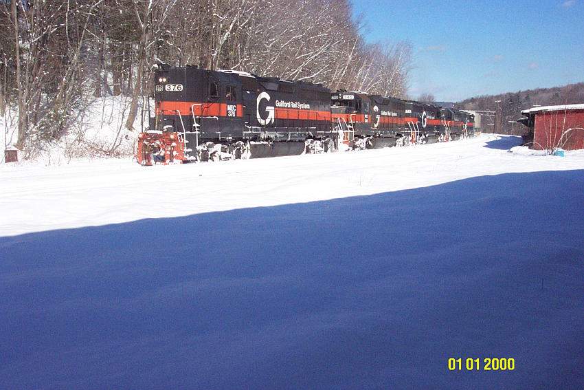 Photo of 5 engines pulling a westbound at West Fitchburg