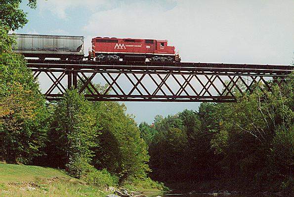 Photo of GP40 #301 on BRRD crosses the New Haven River near Brooksville, VT.