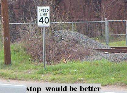 Photo of Stop would be a better sign here!