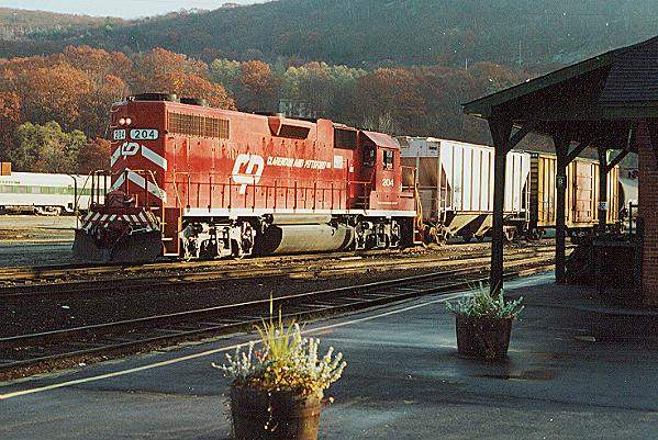 Photo of GP38 #204 in front of the Bellows Falls, VT station in late autumn.