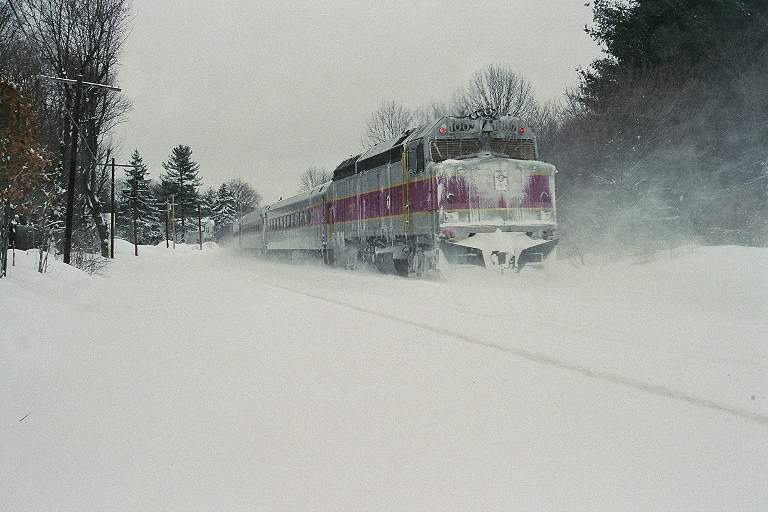 Photo of MBTA F40PH 1007 pushing Train 410 through heavy snow