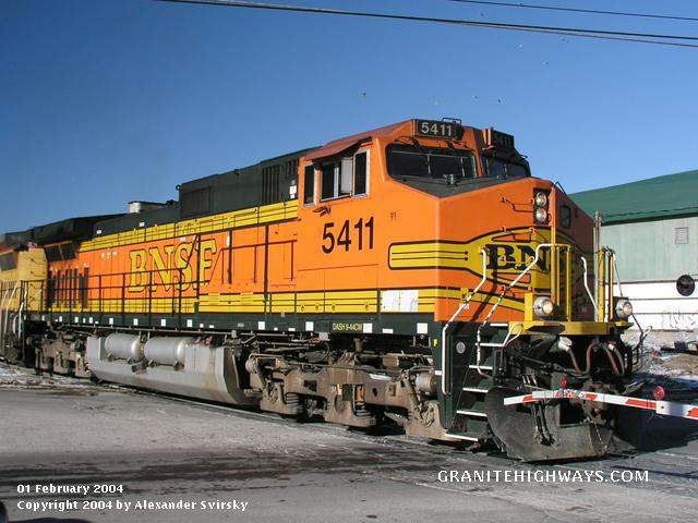Photo of BNSF #5411 leads empty Bow Coal Train.