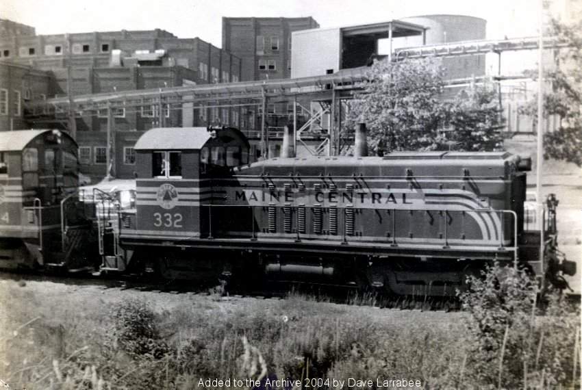Photo of Maine Central #332 in front of the St.Regis Paper Mill at Bucksport, (c) 1970
