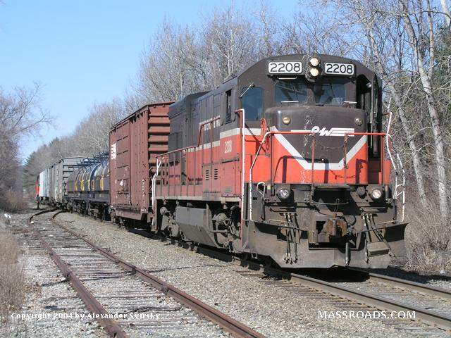 Photo of Providence and Worcester U23B #2208 leads train WX-1 through Oxford.