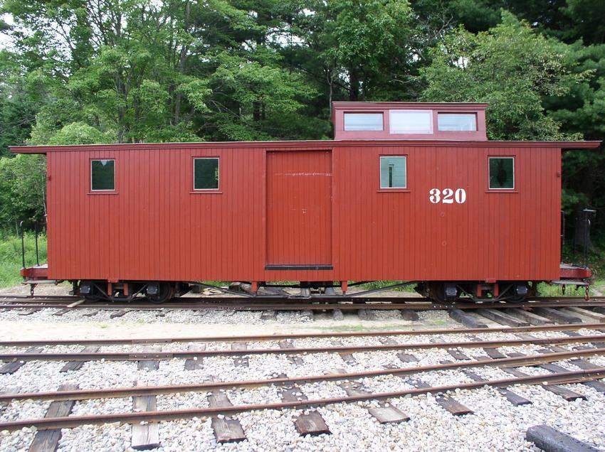 Photo of Caboose 320 For The WW & F RR in Alna, Maine.