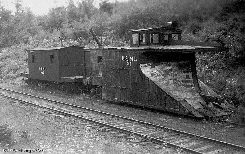 Photo of Snowplow (BML#21) and flanger (BML#43) on siding.  c1950