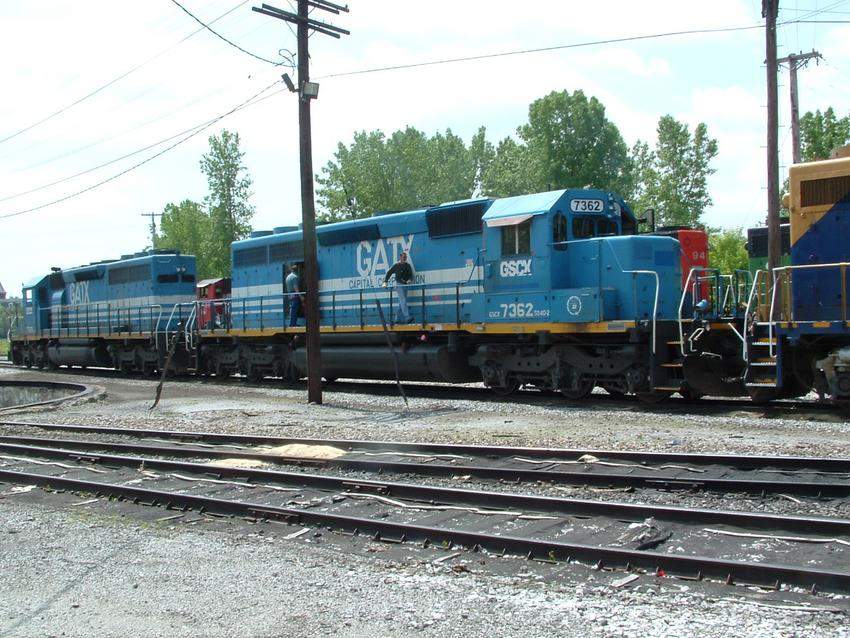 Photo of The crew of NECR 324 starting up the locomotives.