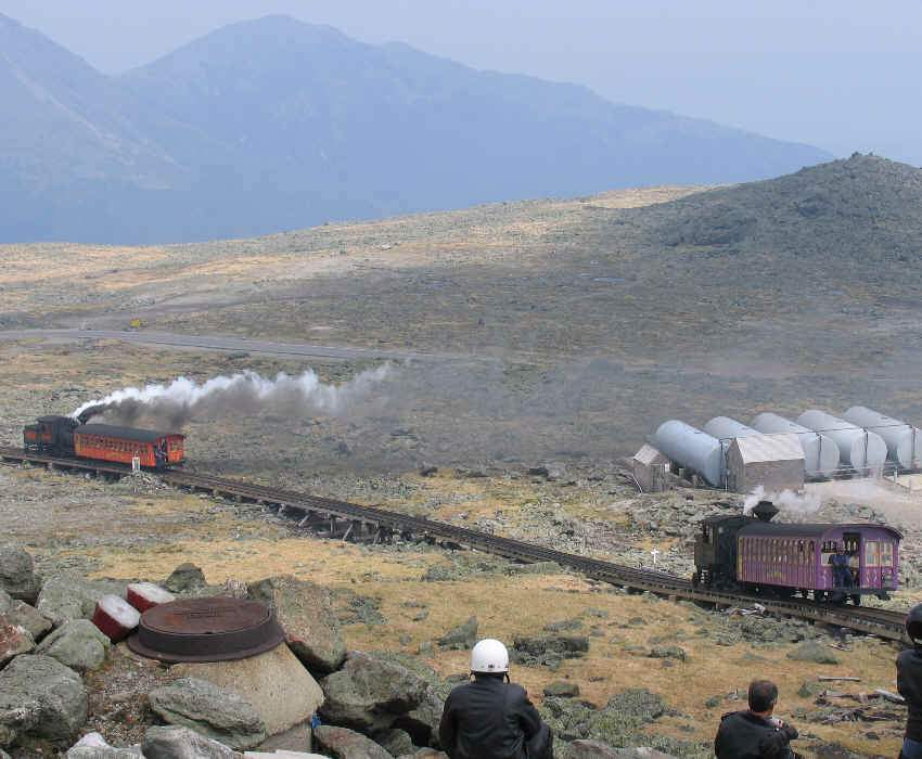 Photo of Two trains going down mountain