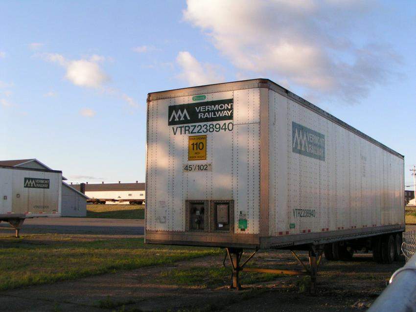 Photo of Some Intermodal Train Trailer waiting for  a load.