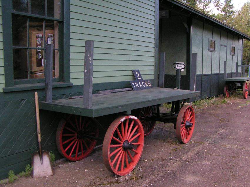 Photo of An old baggage wagon on display in Oakfield, Maine.