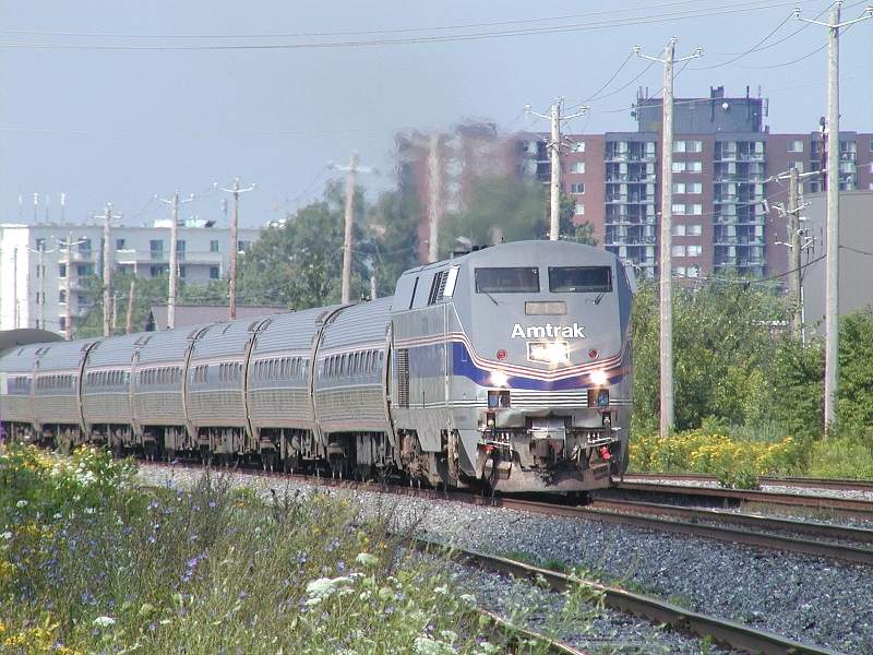 Photo of Southbound Amtrak 713 leads the 'Adirondack' at Ville LeMoyne, Quebec