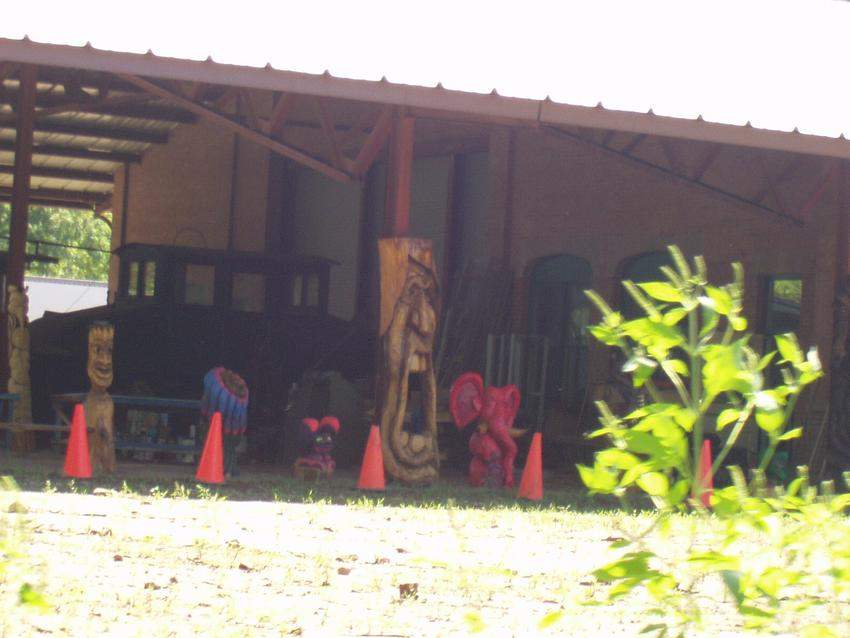Photo of Wooden Figures behin visitors center