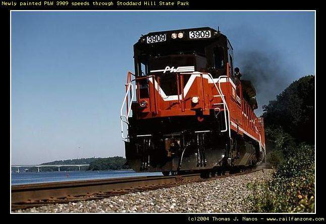 Photo of Newly painted P&W 3909 races past Stoddard Hill State Park in Gales Ferry, CT