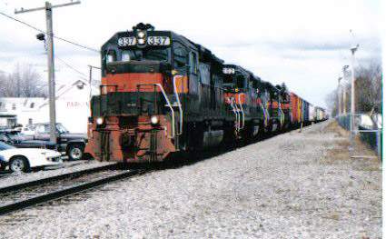 Photo of Main line freight approaching Old Orchard Beach crossing.