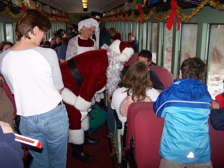 Photo of Santa and Mrs. Claus bring happiness to the children on the GMRC