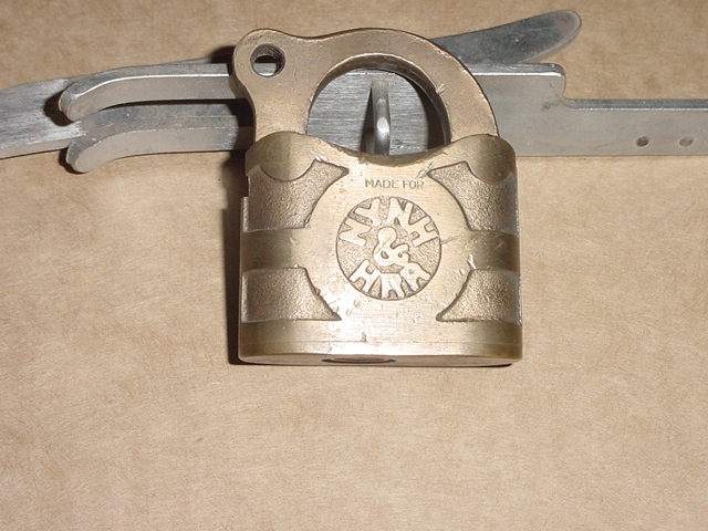 Photo of NYNHHRR-Brass communications lock.