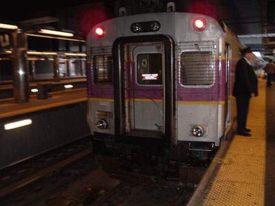 Photo of MBTA commuter train arriving at the Fleet Center in Boston.