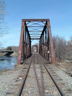 Photo of Maine Central Railroad crossing the Penobscot River, Old Town, Maine.