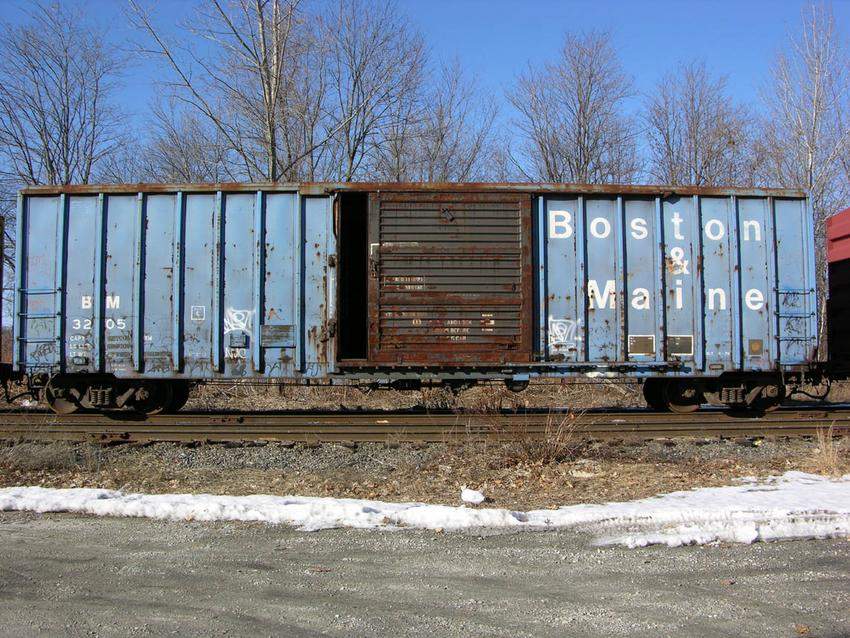 Photo of Boston & Maine XM boxcar in Lowell Mass