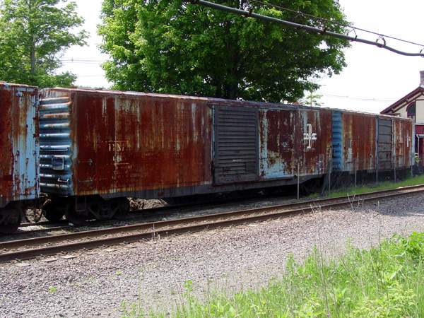 Photo of Boxcars and caboose in Littleton at old B&M station