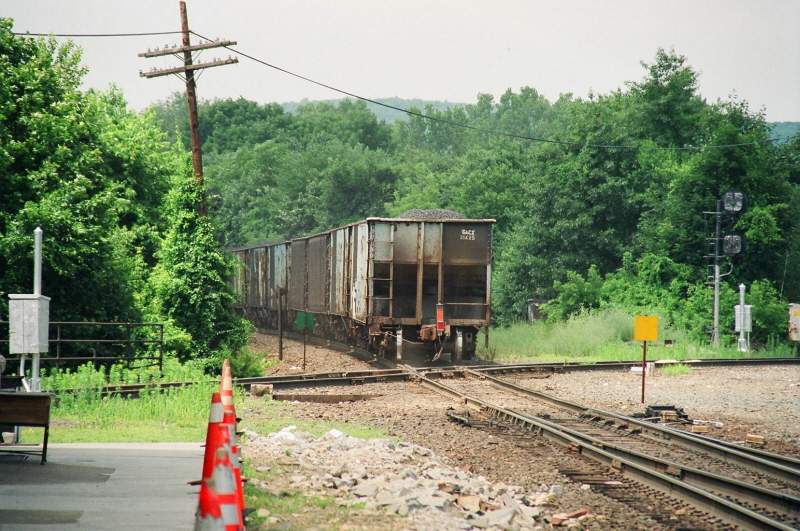 Photo of P&W -CSX Loaded Coal Train V-719 Clear Of The Diamond.