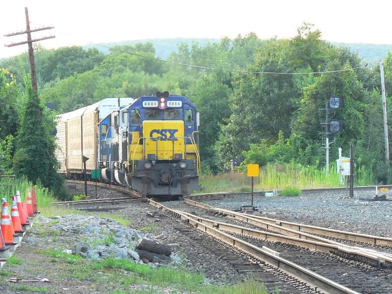 Photo of a CSX train with  on the way through Plamer Mass.