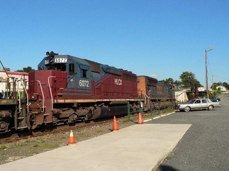 Photo of a CSX, hclx engine  train with the way through Plamer Mass.
