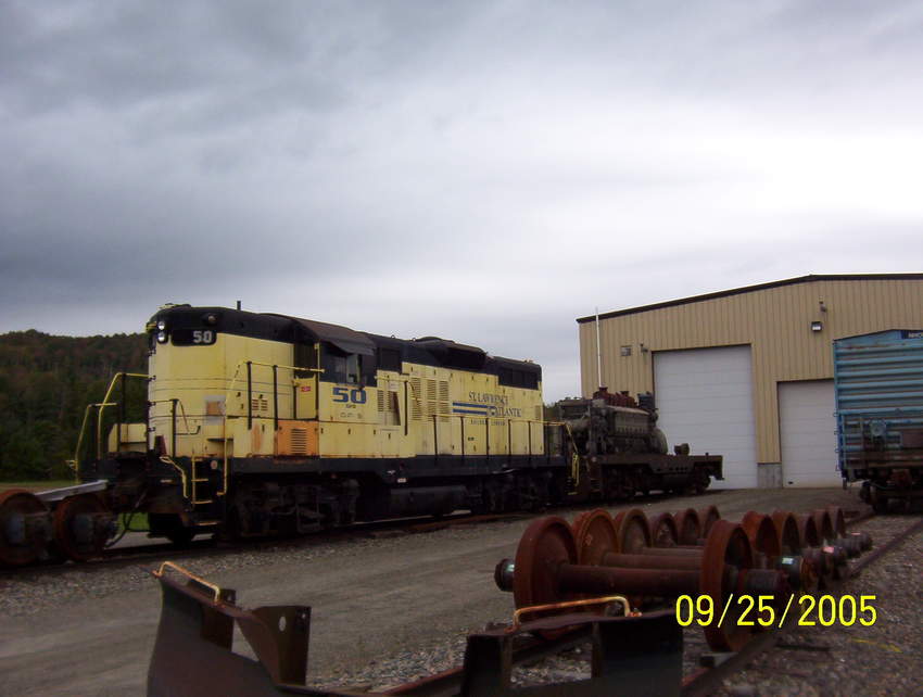 Photo of Ex SLR GP-9 # 50 and another former GP-9 Stripped