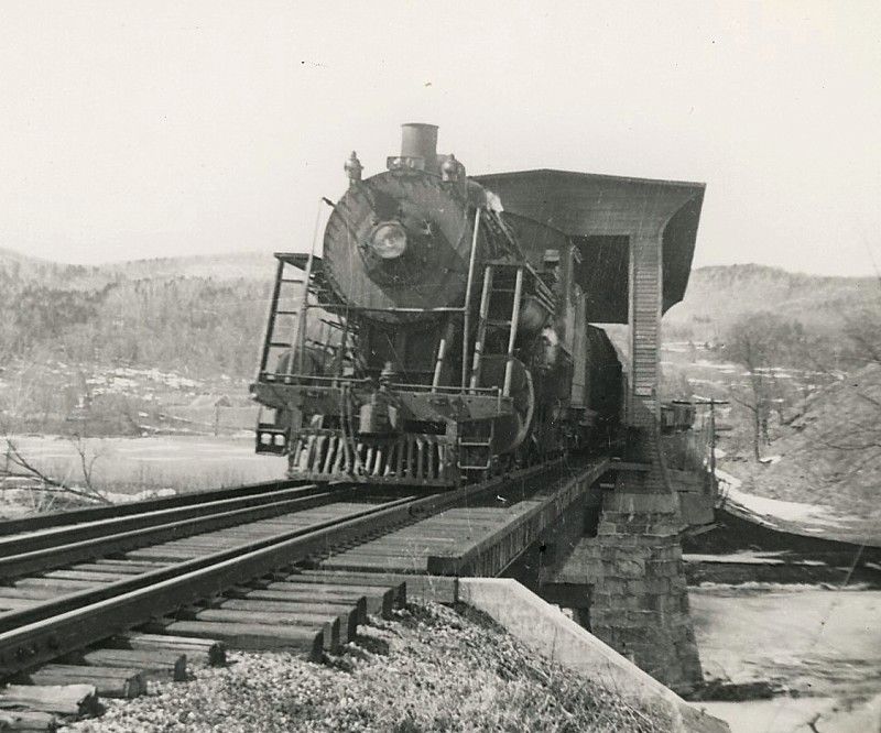 Photo of Train #74 Cambridge Jct. coming through the bridge