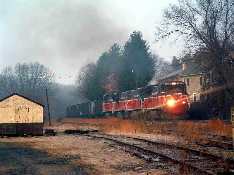 Photo of PW B39-8 #3905 leads an empty Johnson City NY coal extra on NECR rails.