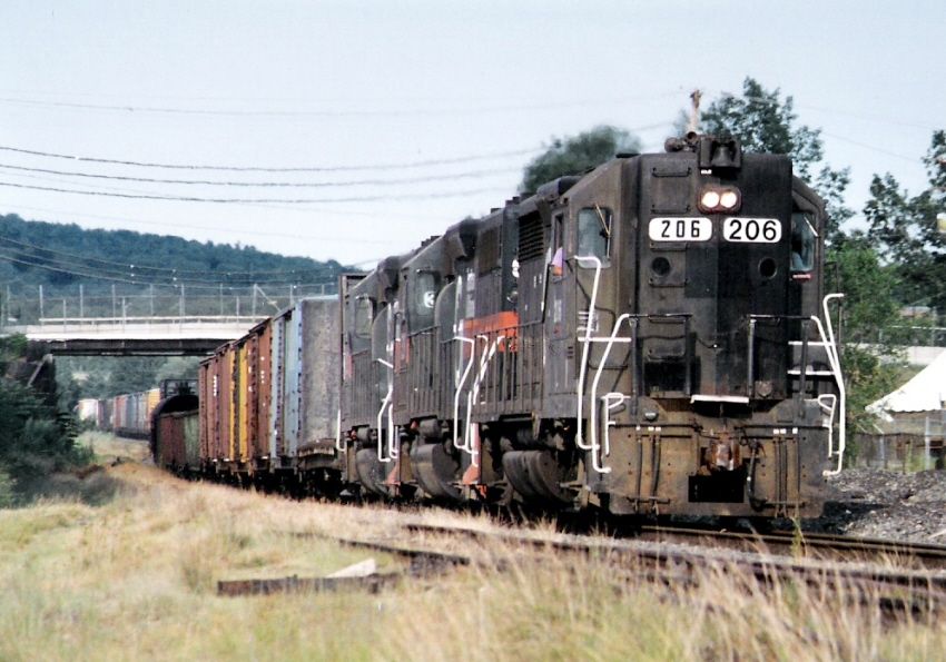 Photo of A long BADH approaches Lawrence Yard in 1993