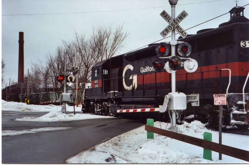 Photo of Guilford Rail System Freight Train Crossing Route 225 in Forge Village