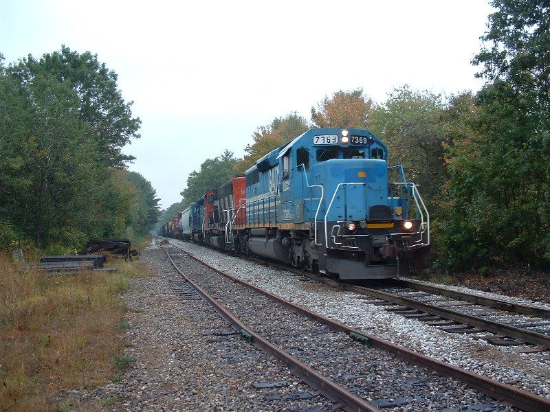 Photo of NECR train 608 north approaching State Line crossing Monson MA 09/23/06