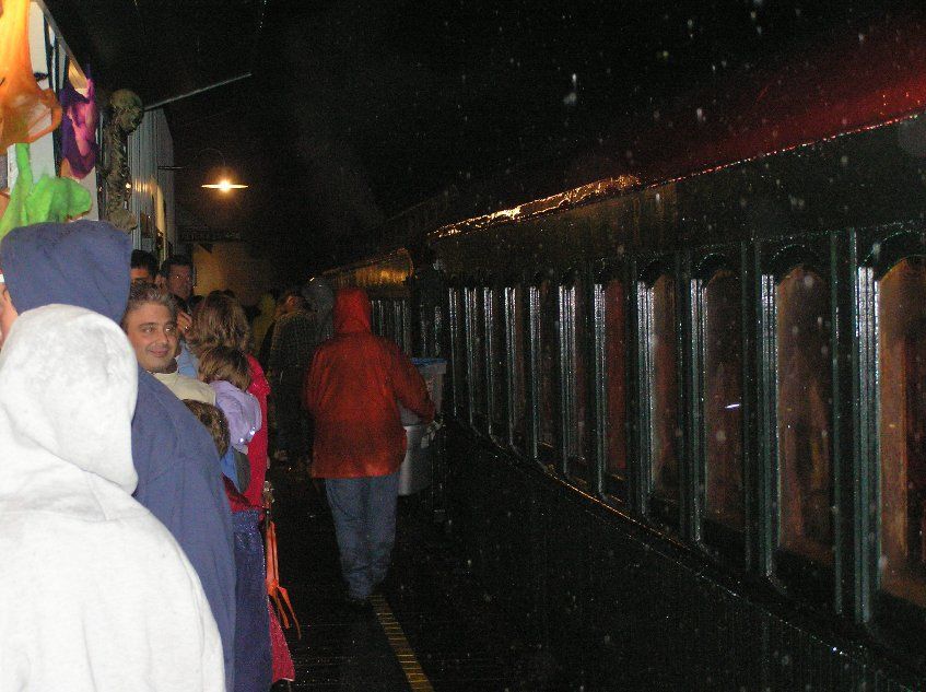 Photo of Weary Passengers Wait to Load on the Halloween Trains